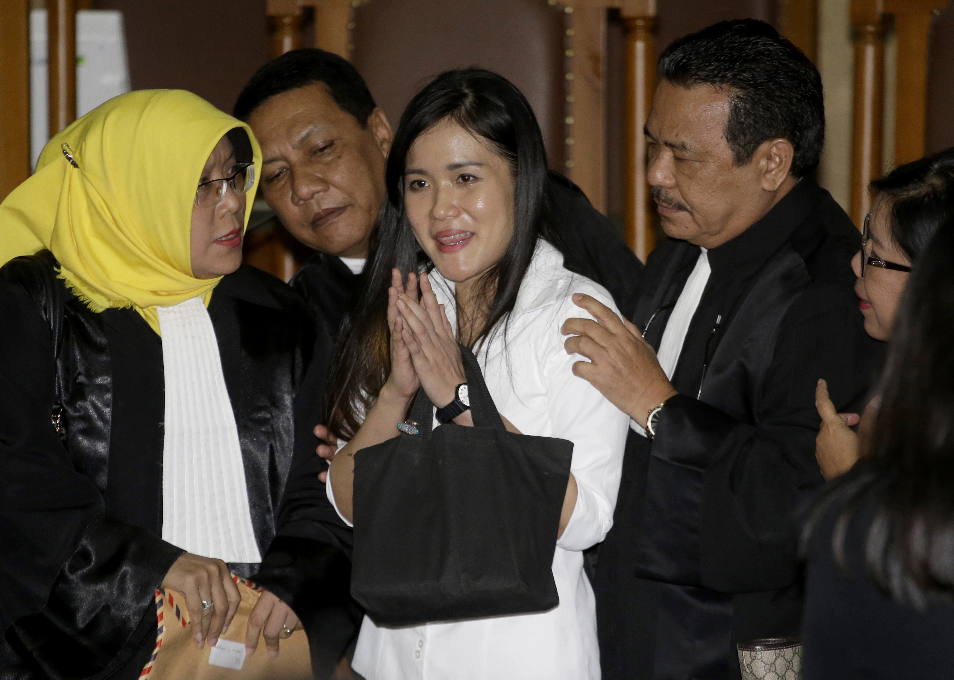 Wongso surrounded by her lawyers at her sentencing on Oct. 27, 2016.