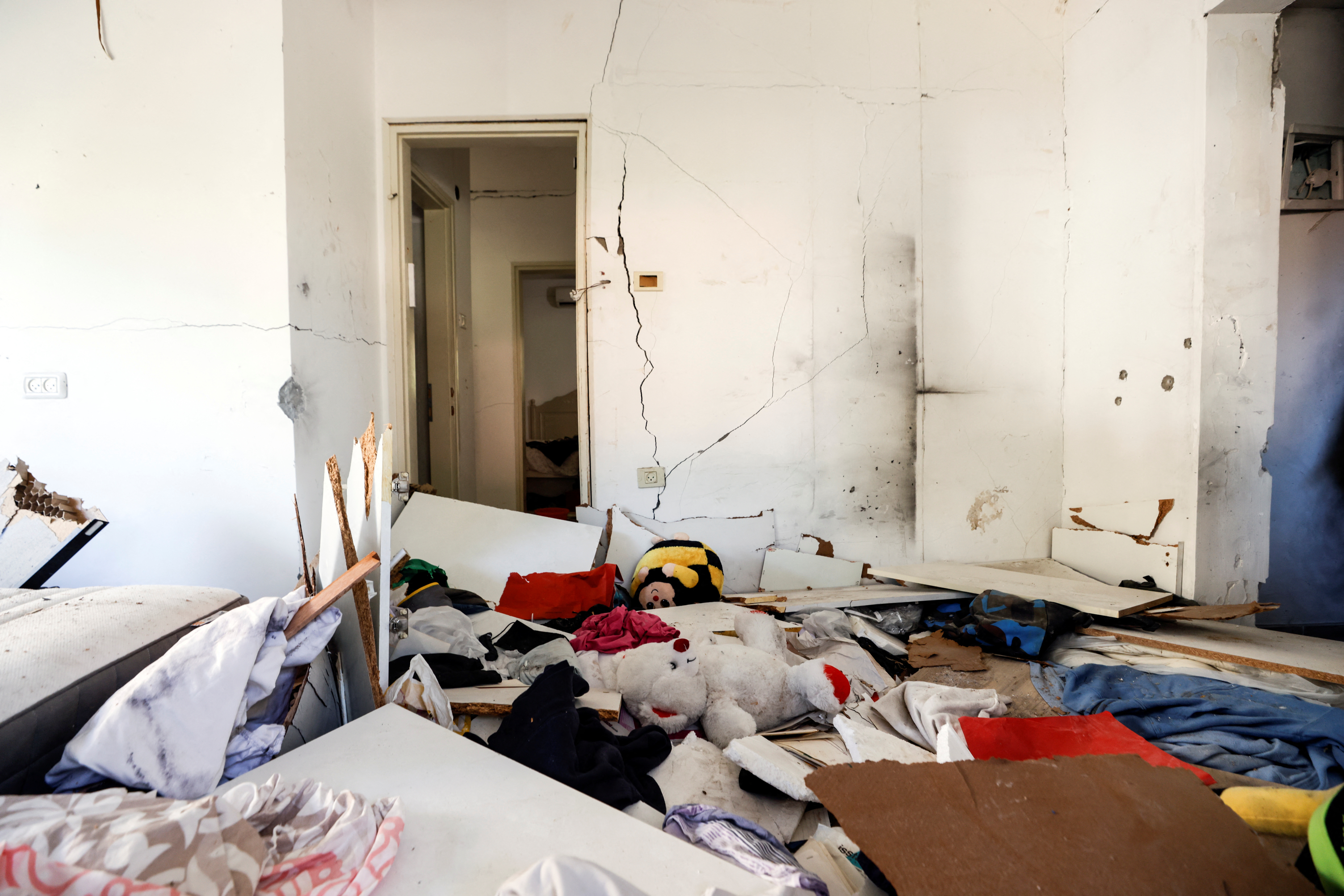 Toys and other belongings are seen inside a damaged family home in Kibbutz Nir Oz following a deadly infiltration by Hamas gunmen from the Gaza Strip, in Kibbutz Nir Oz in southern Israel October 19, 2023. 