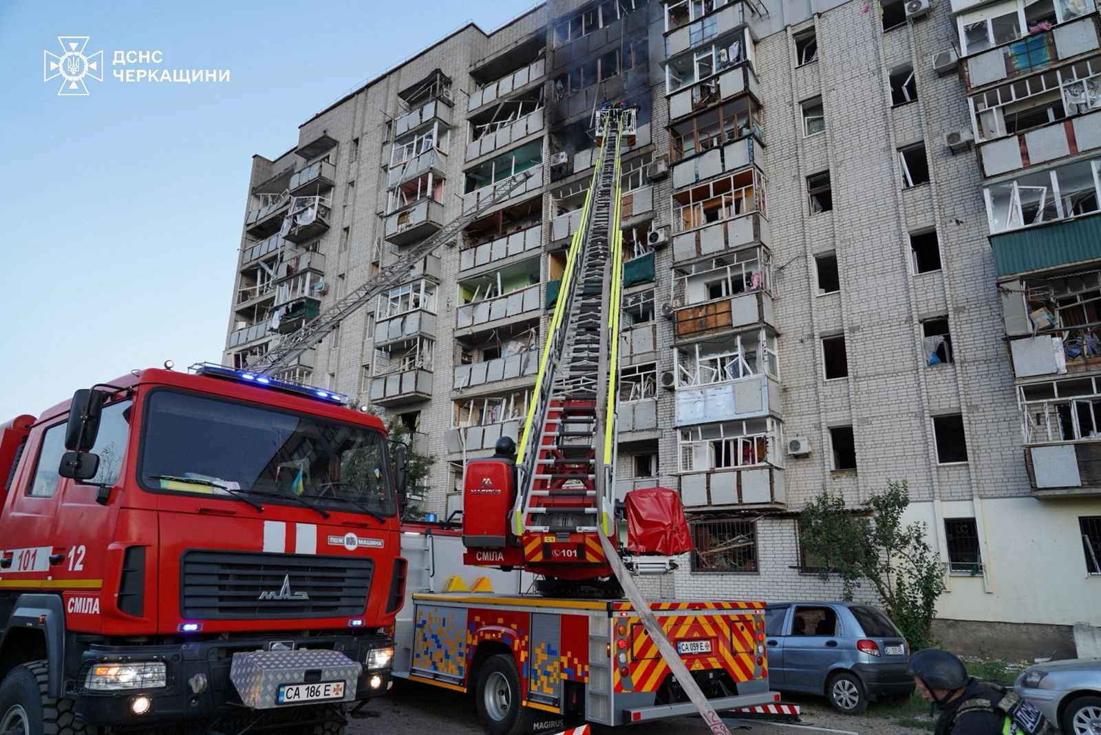 Firefighters at the site of a damaged apartment building in Smila, Ukraine.