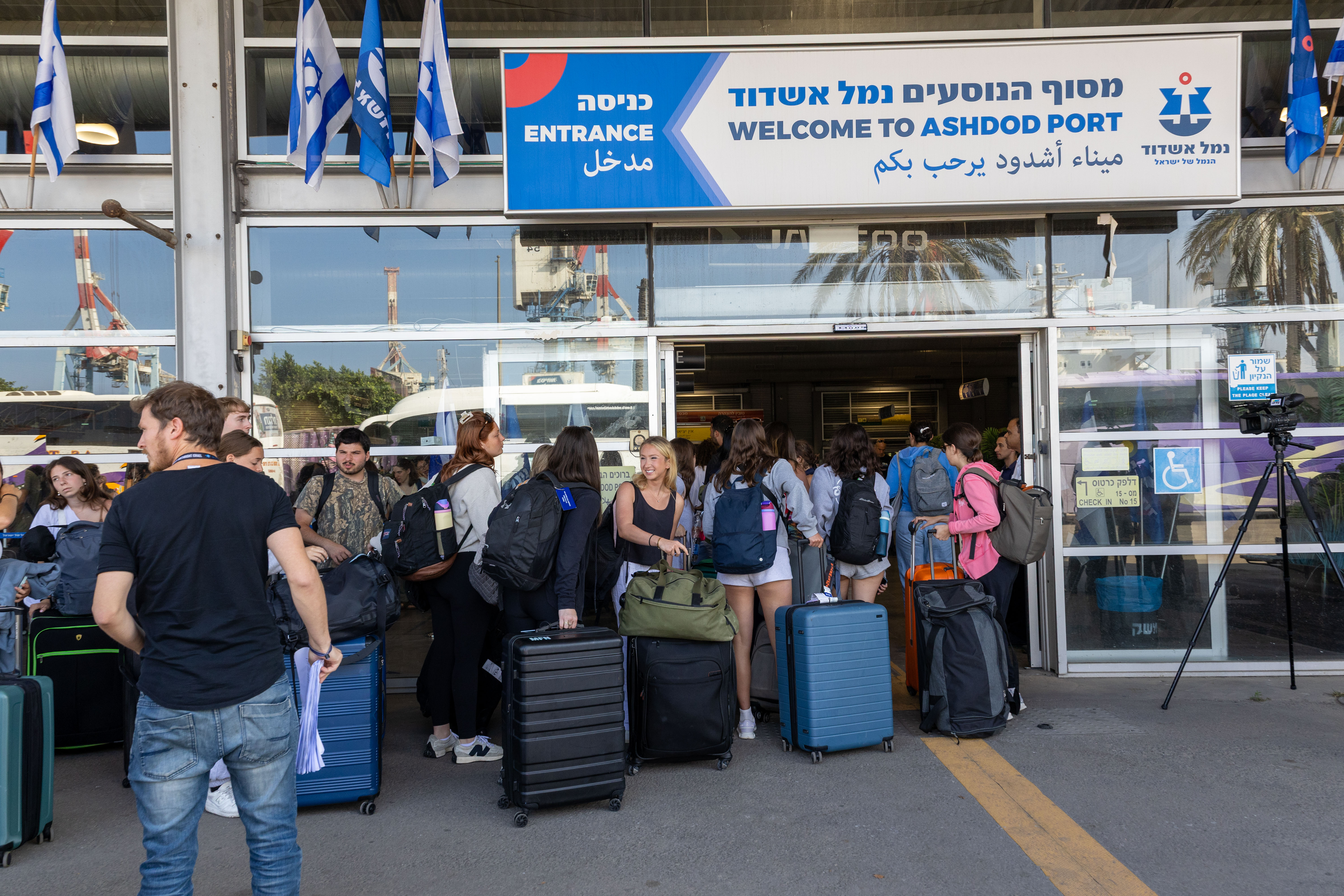 Birthright Israel program participants with luggage at Ashdod Port.
