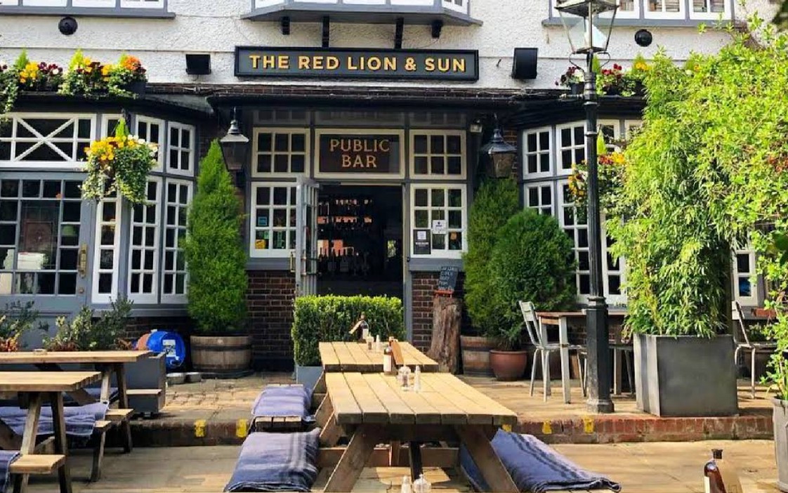 The Red Lion & Sun pub in Highgate, with outdoor seating.