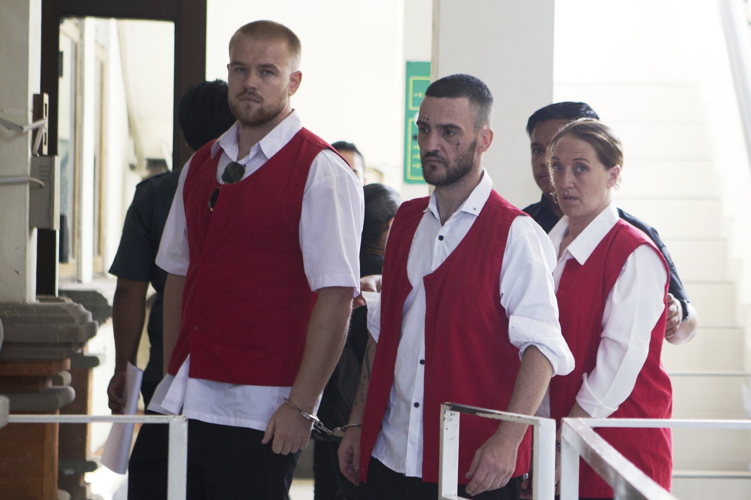 Phineas Float, Jonathan Collyer and Lisa Stocker arrive at the star of their trial hearing at Denpasar District Court in Bali on June 3, 2025.