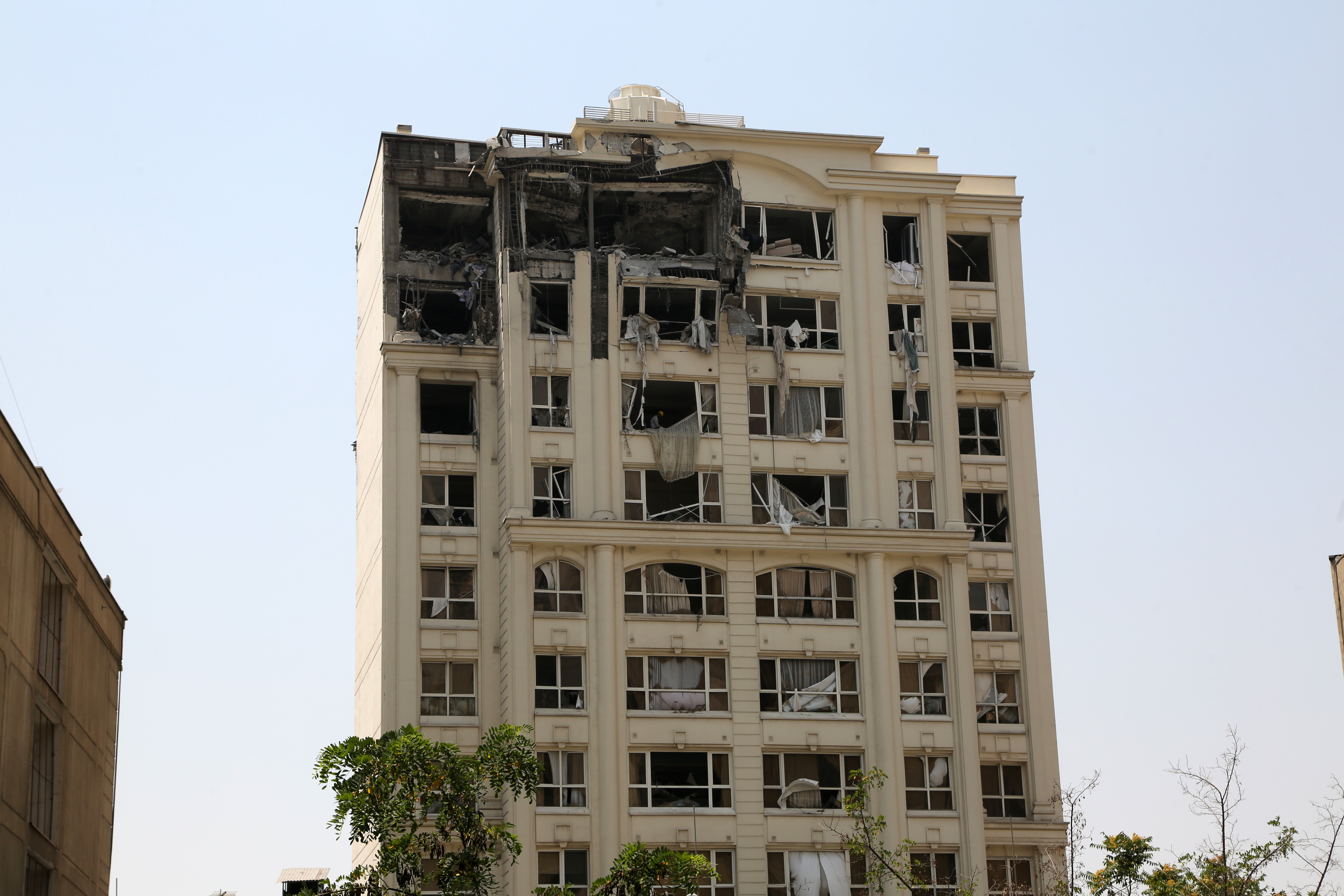 Damaged residential building in Tehran after Israeli strikes.