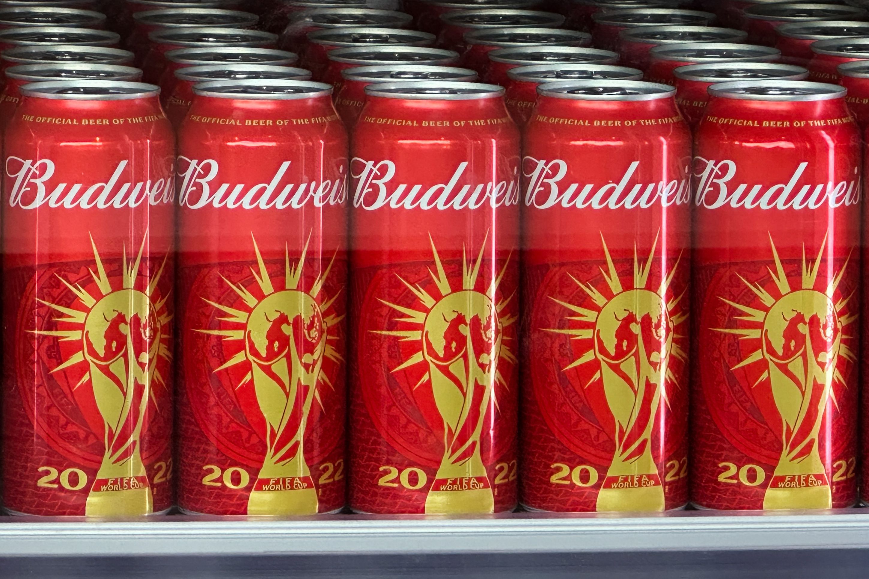 Budweiser beer cans featuring the FIFA World Cup logo.