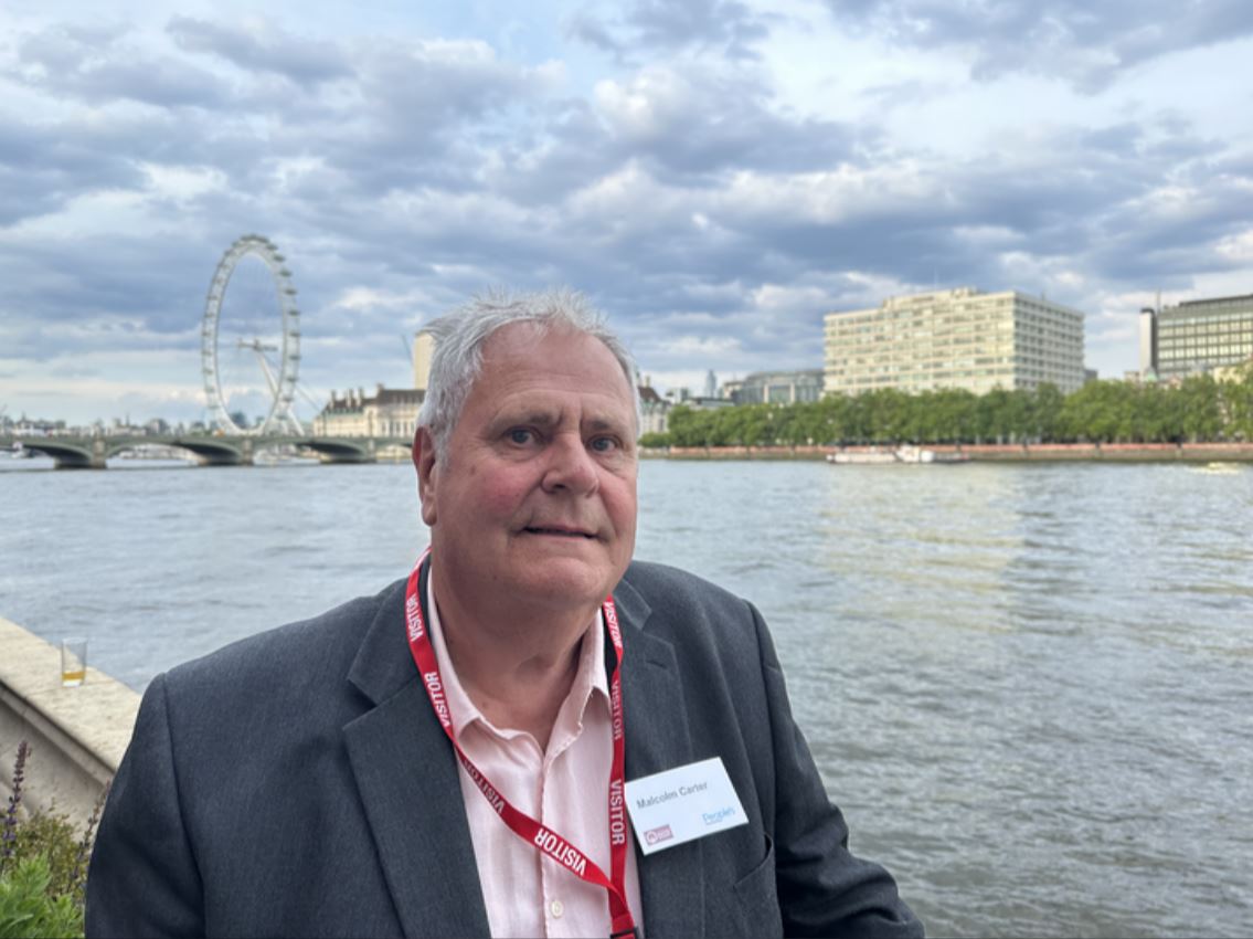 Malcolm Carter in London, with the London Eye in the background.