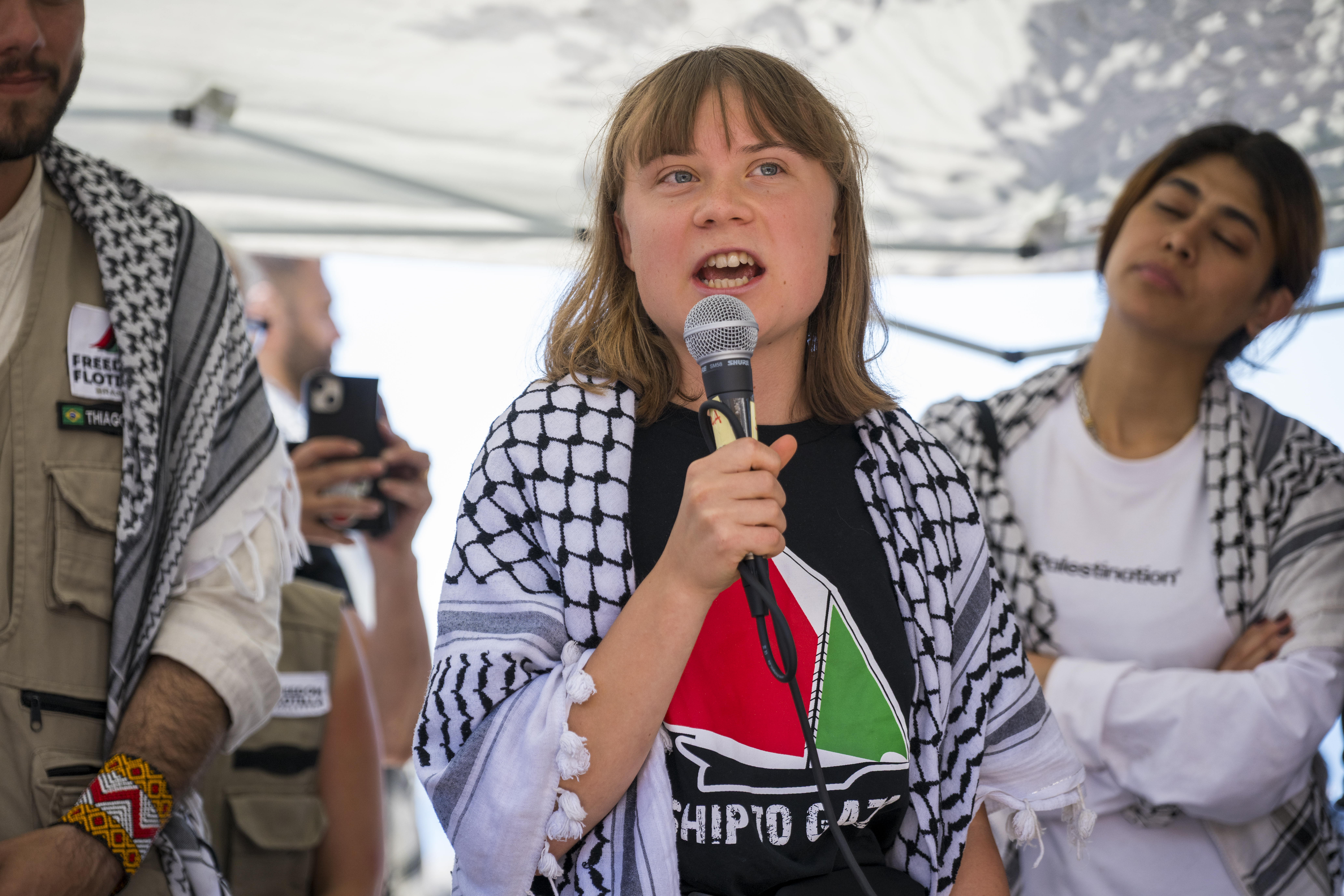 Greta Thunberg speaking at a press conference before departing for Gaza.