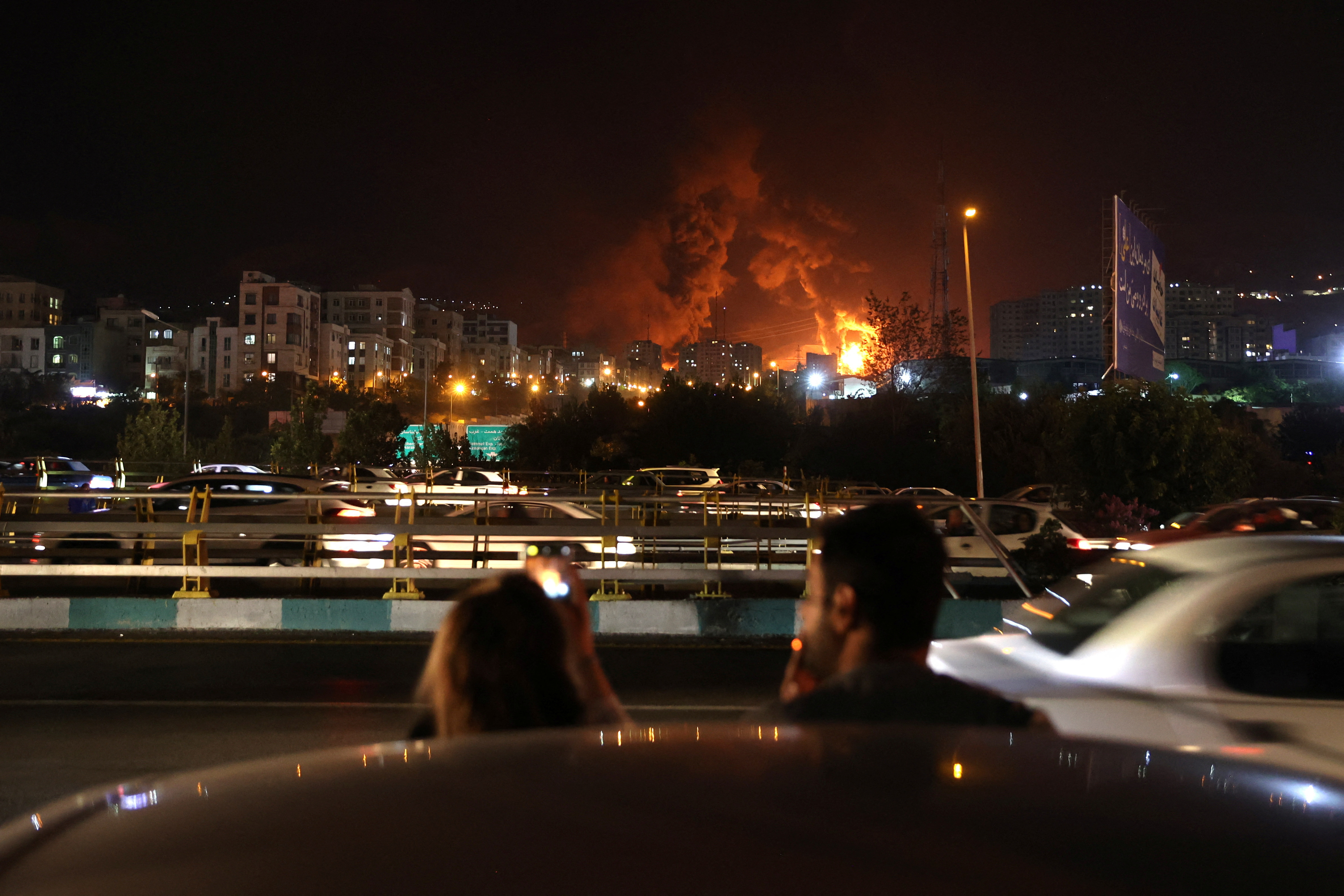 The Sharan Oil depot on fire following an Israeli strike in Tehran on June 15, 2025.