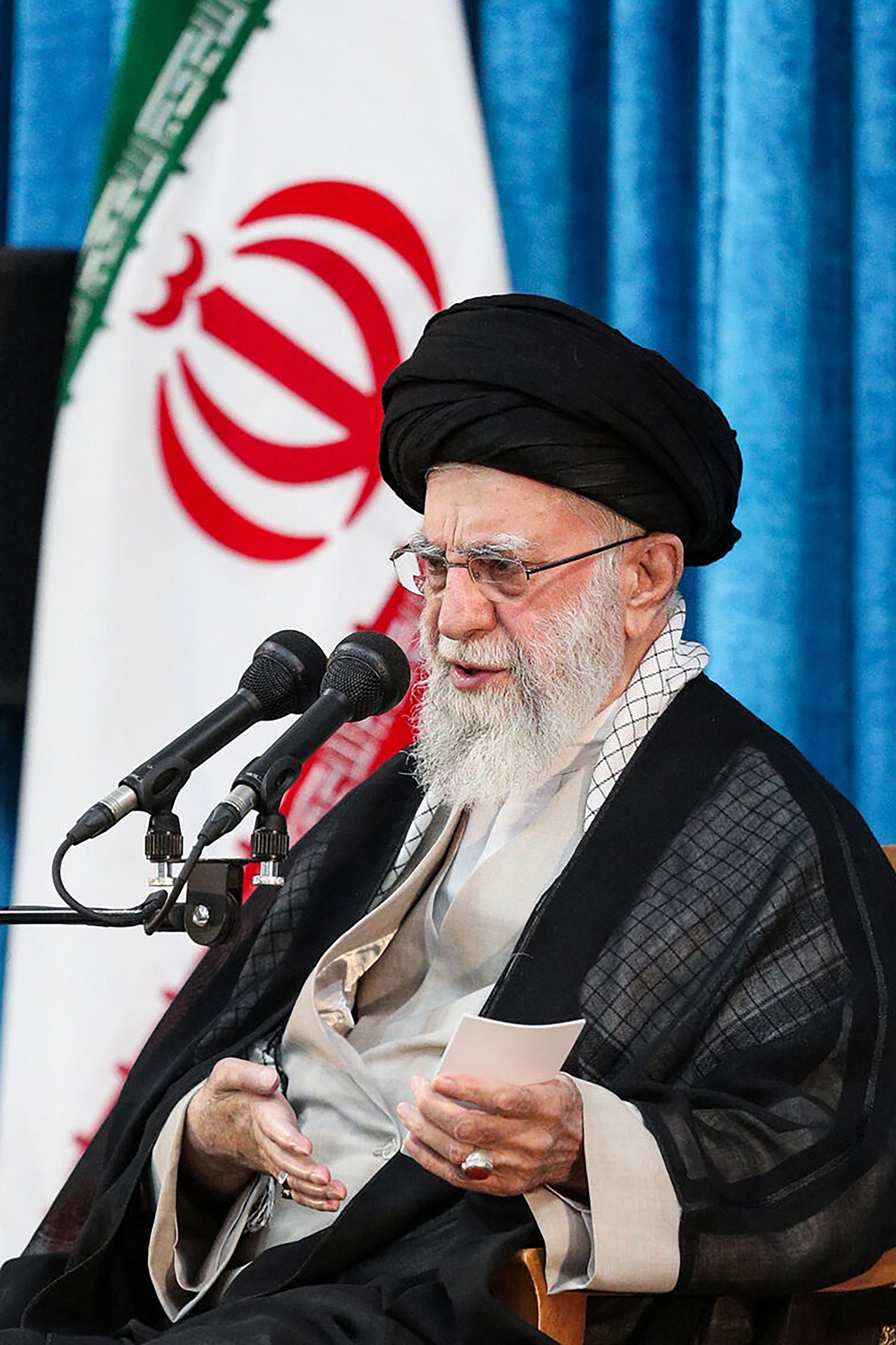 Ayatollah Ali Khamenei speaking at a ceremony.