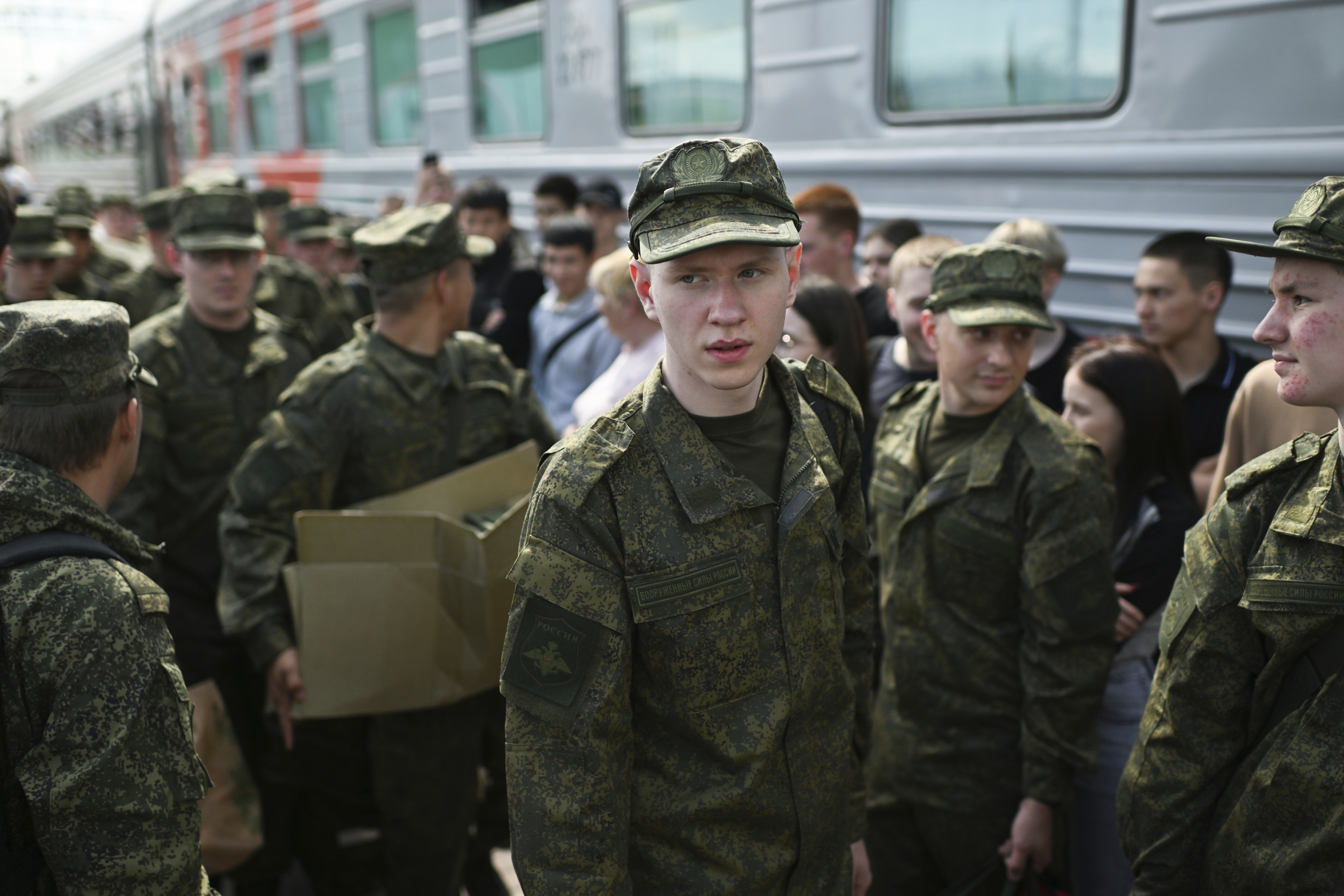 Russian conscripts at a train station.