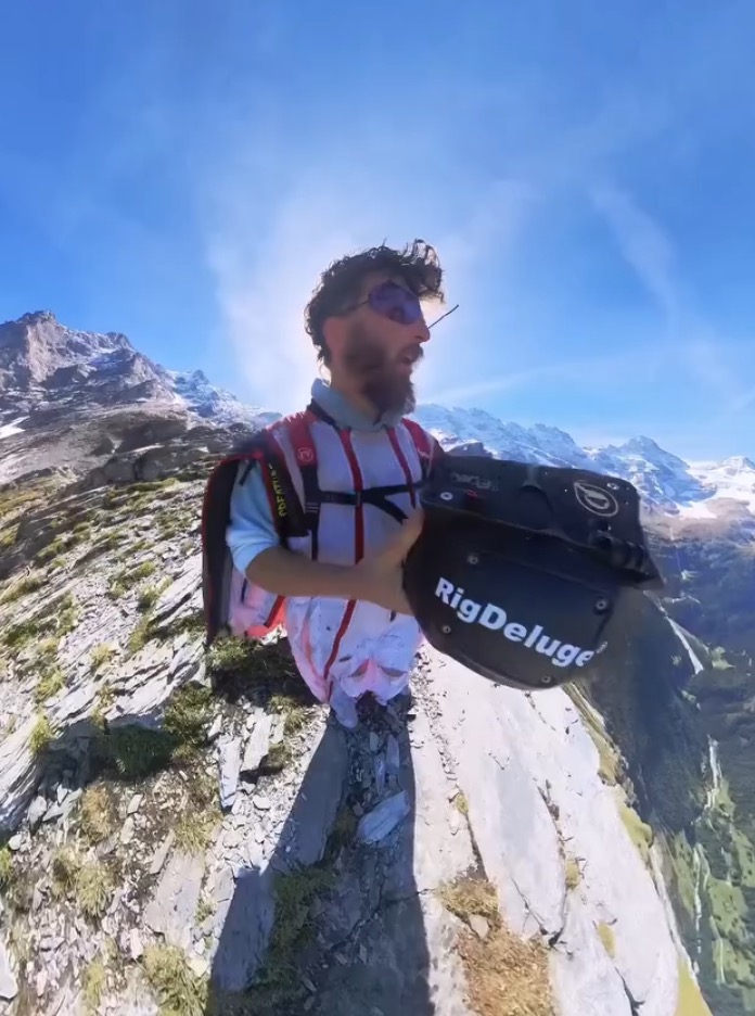 Wingsuit flier on a mountain.