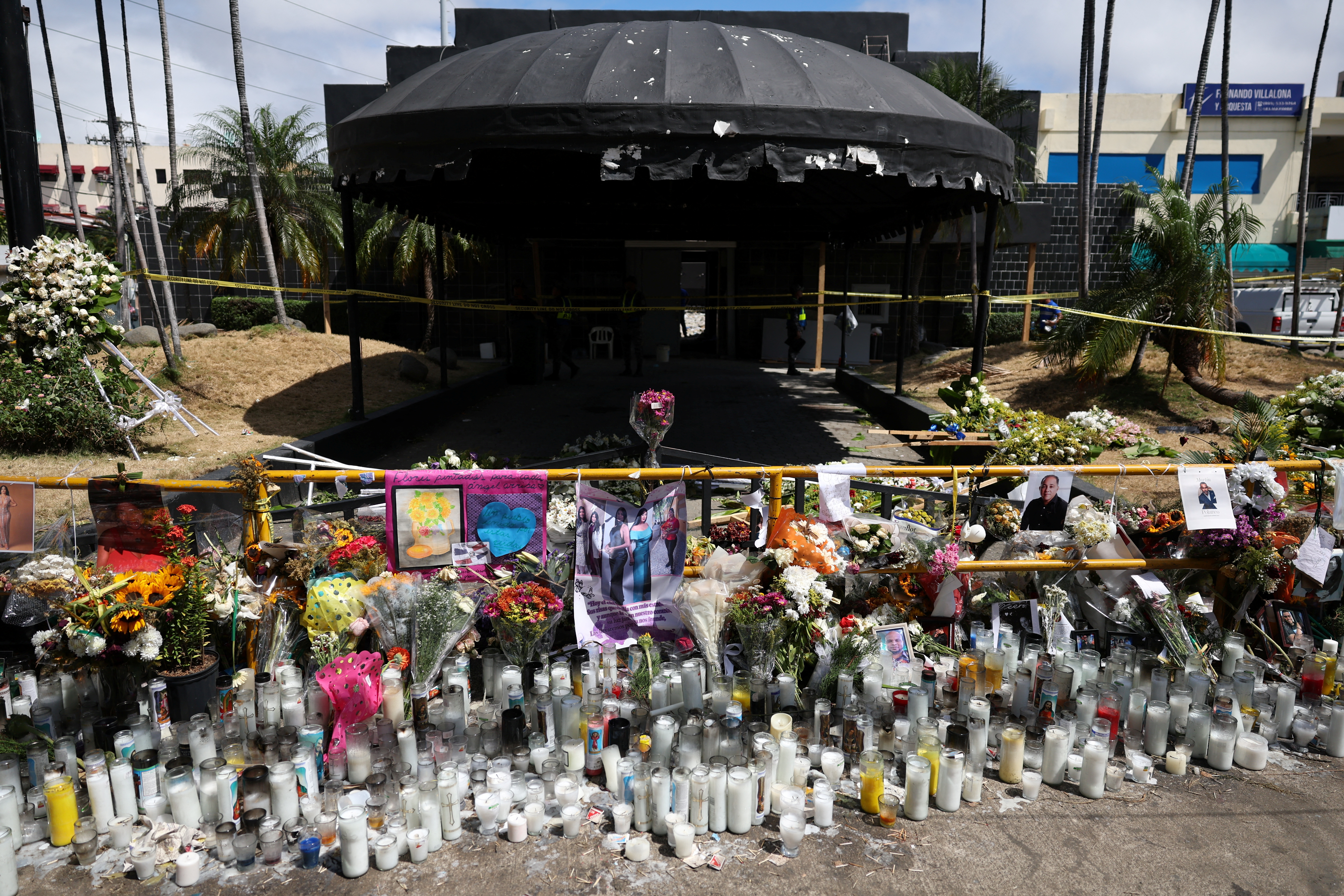 Makeshift memorial outside nightclub after roof collapse in Santo Domingo.