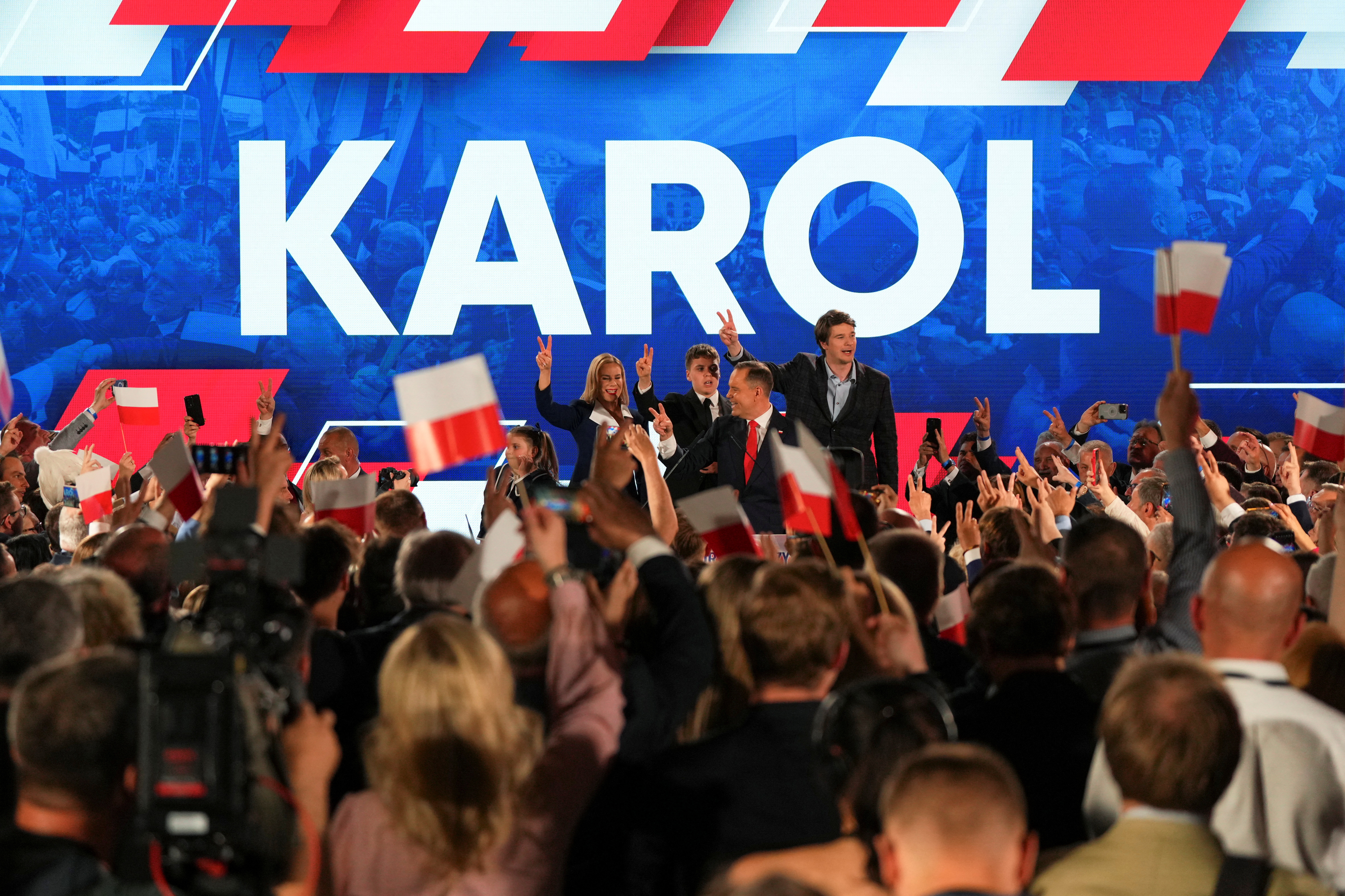 Karol Nawrocki and his family reacting to Polish presidential election exit polls.
