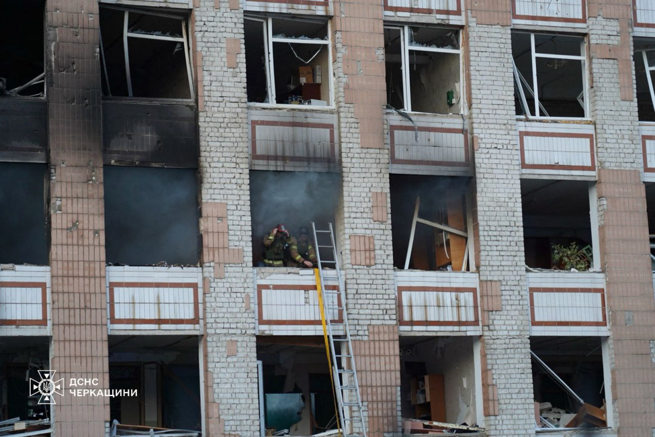 Firefighters at a damaged building in Smila, Ukraine.