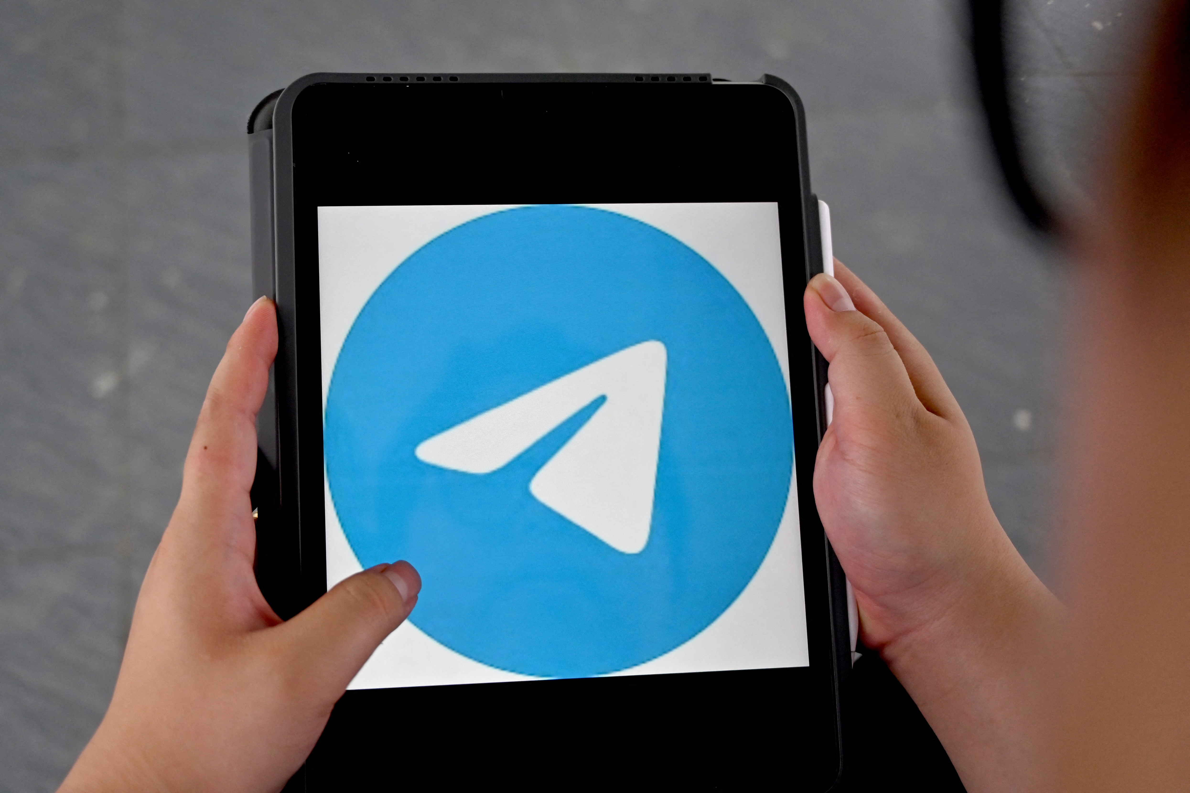 Telegram app logo on an iPad.