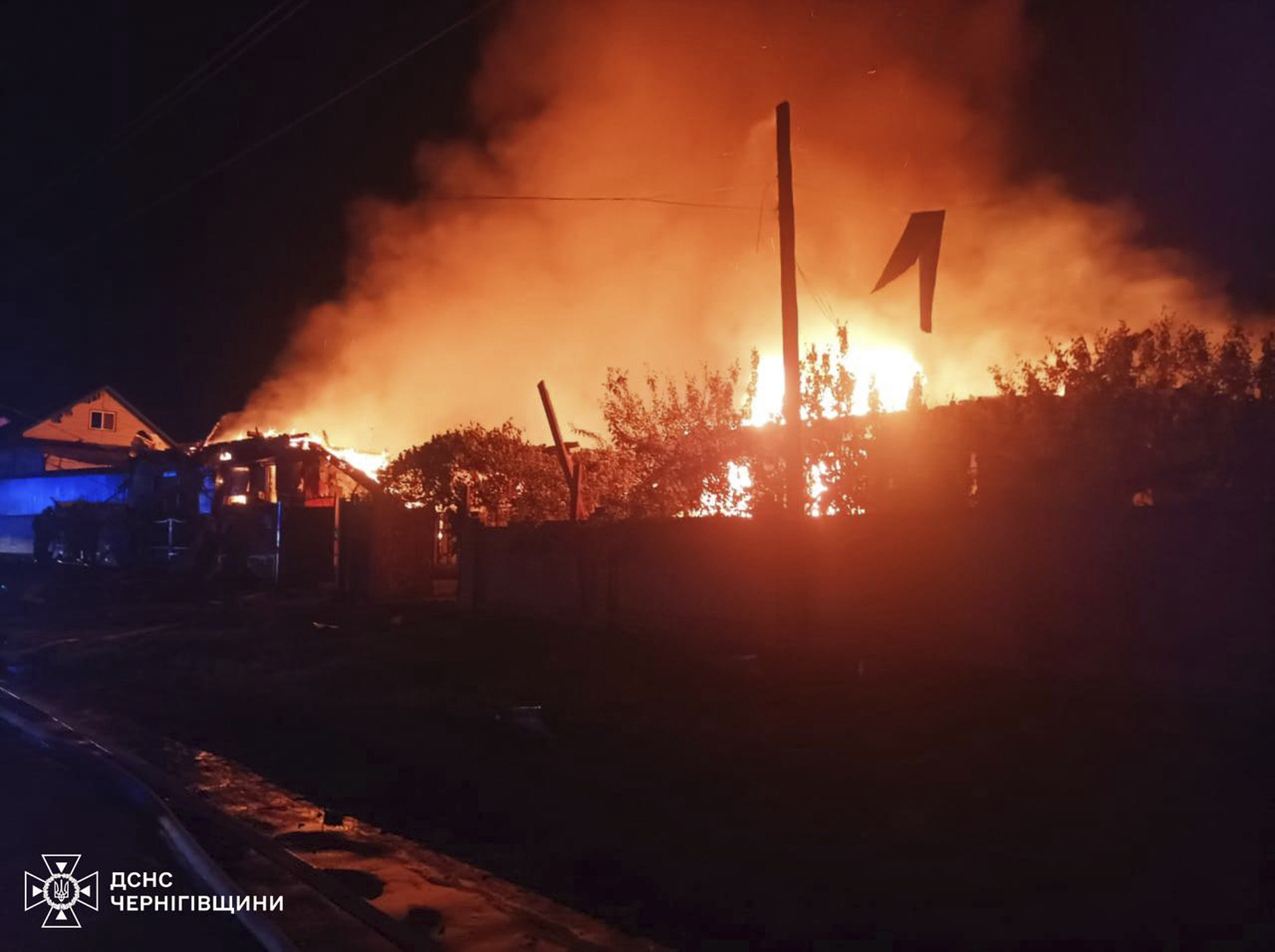 Fire lights up the night sky after a Russian drone strike in the Chernihiv region on June 5, 2025.