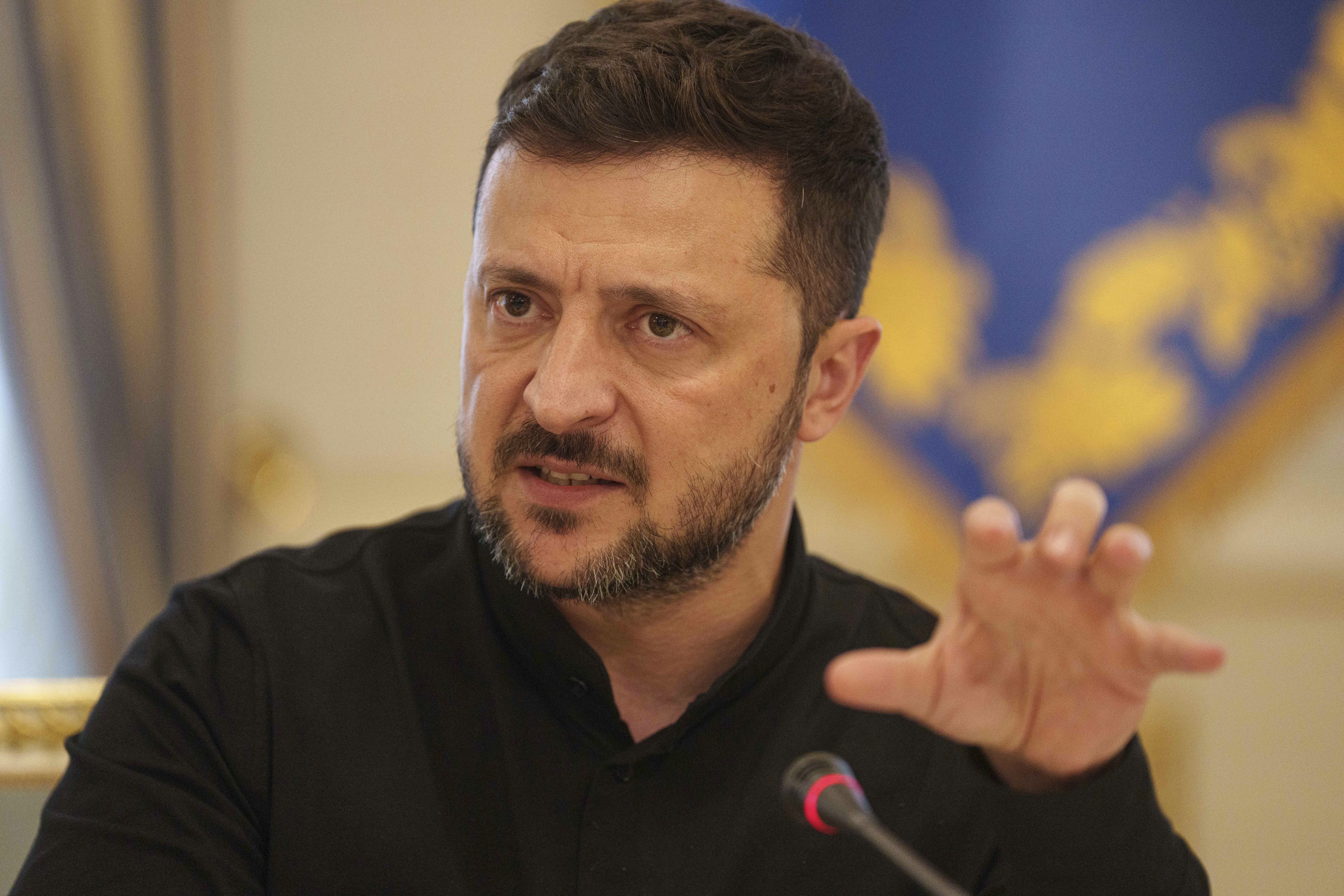 Volodymyr Zelenskyy speaking at a press conference.