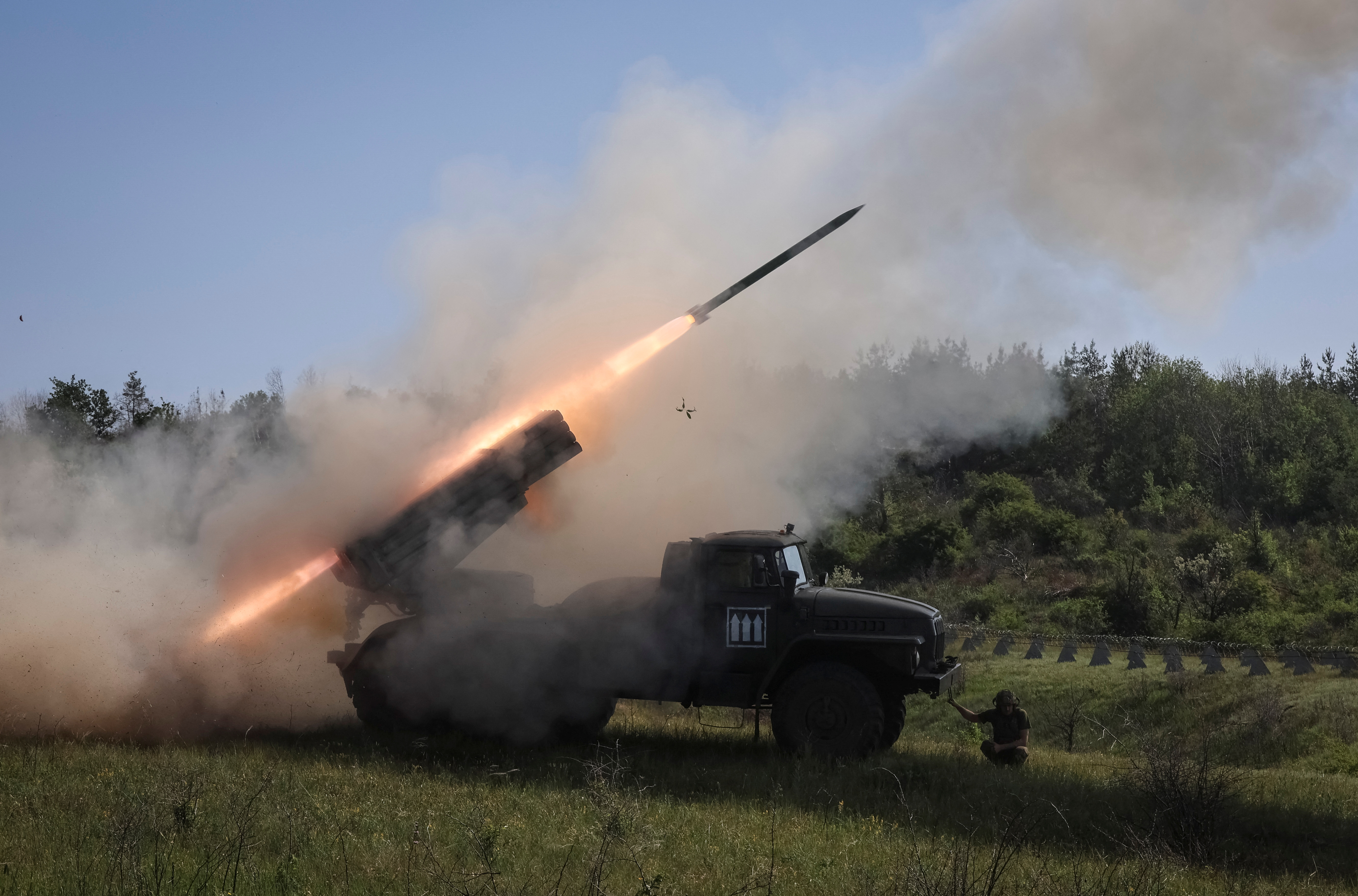 Ukrainian servicemen firing a BM-21 Grad multiple rocket launcher.