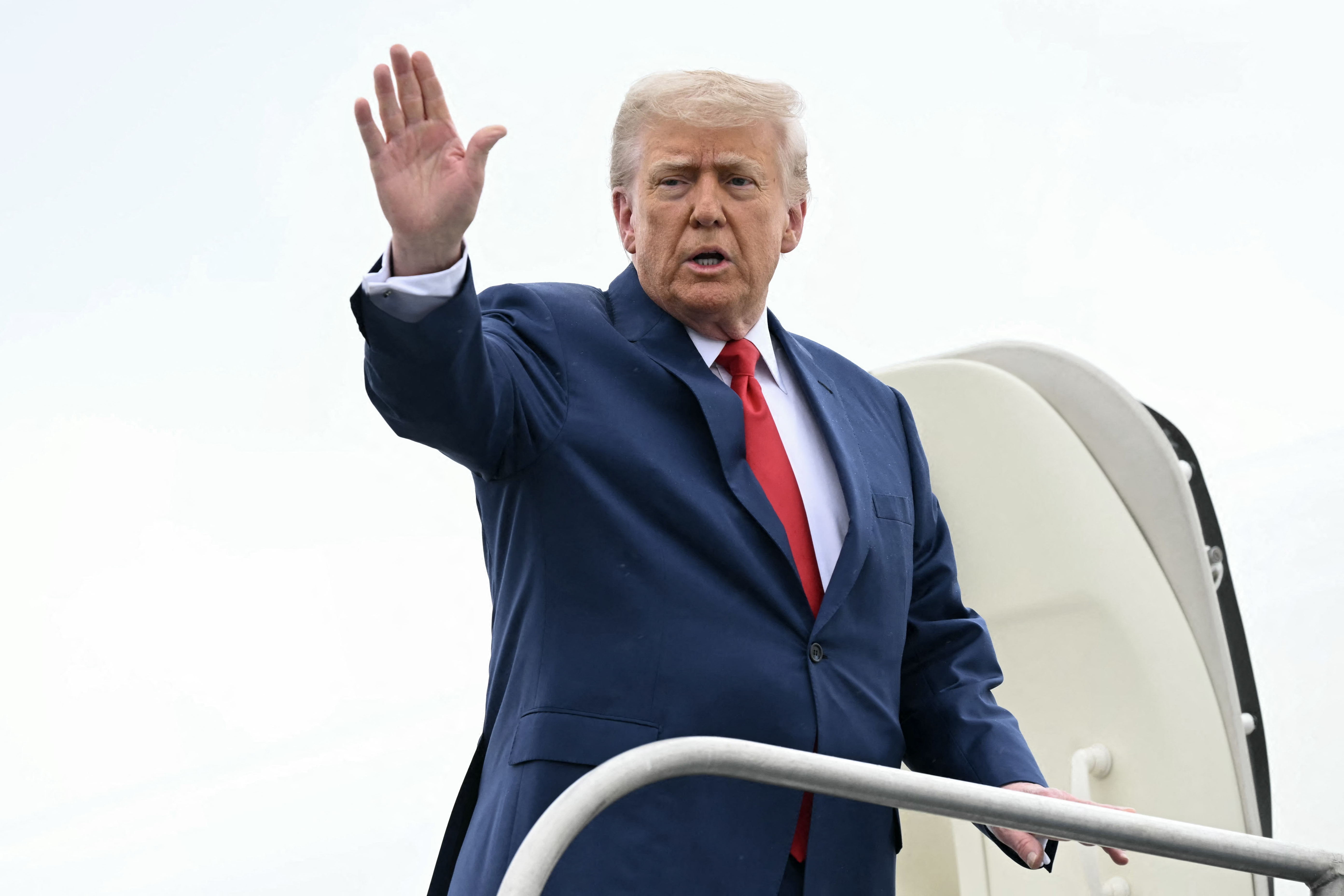 Donald Trump waving goodbye.