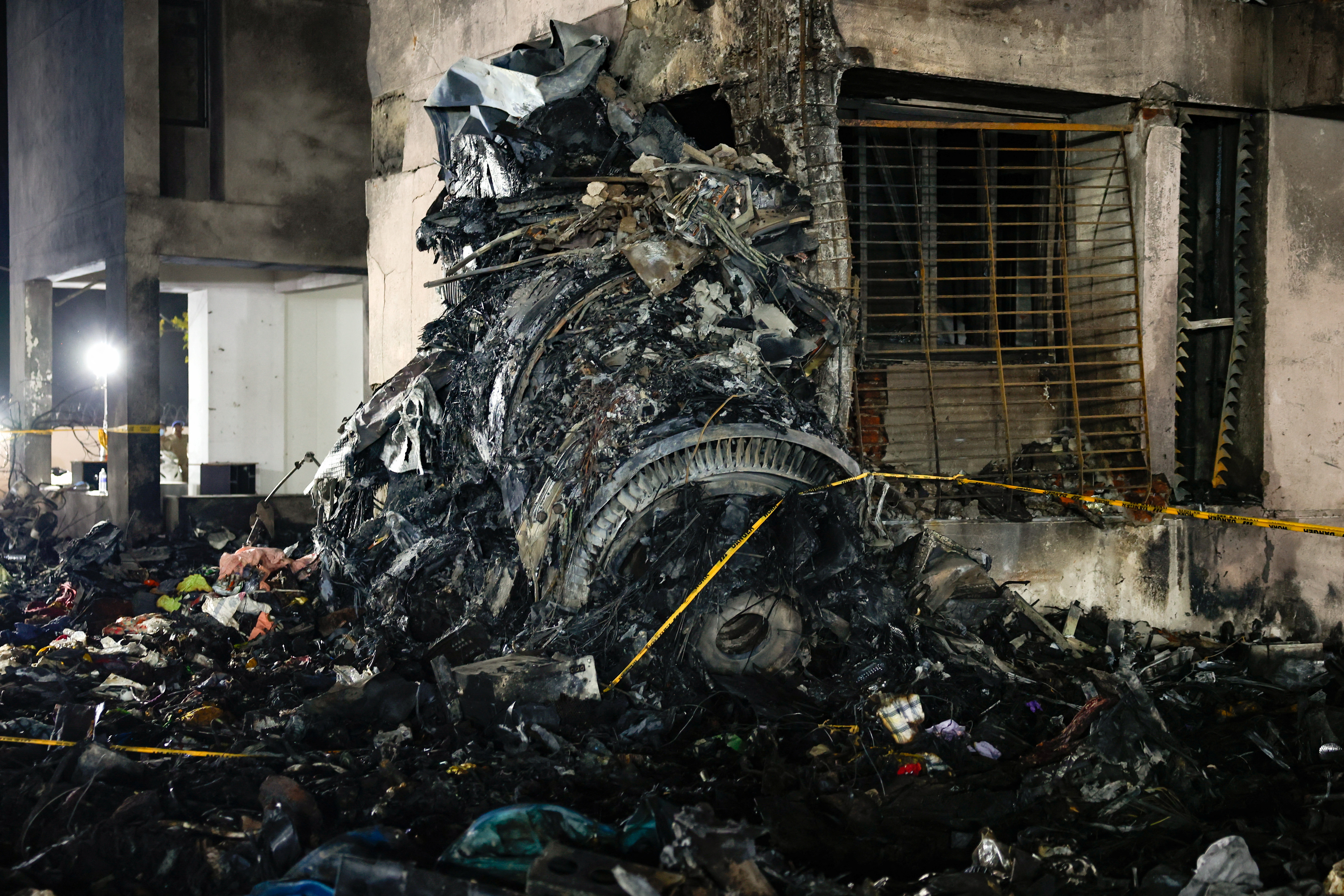 Burned wreckage of an Air India plane after a crash.