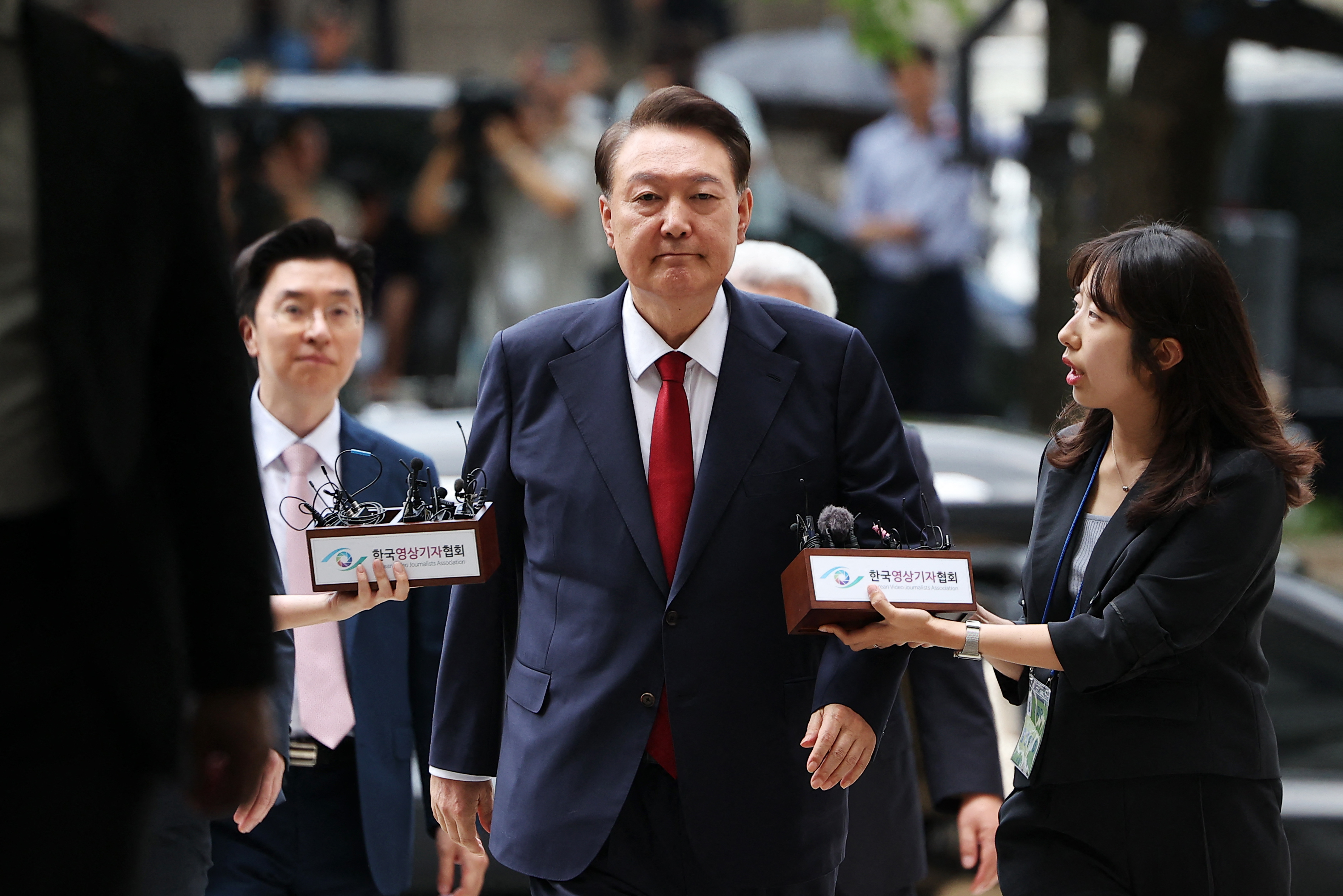Former South Korean president Yoon Suk Yeol arriving at court.