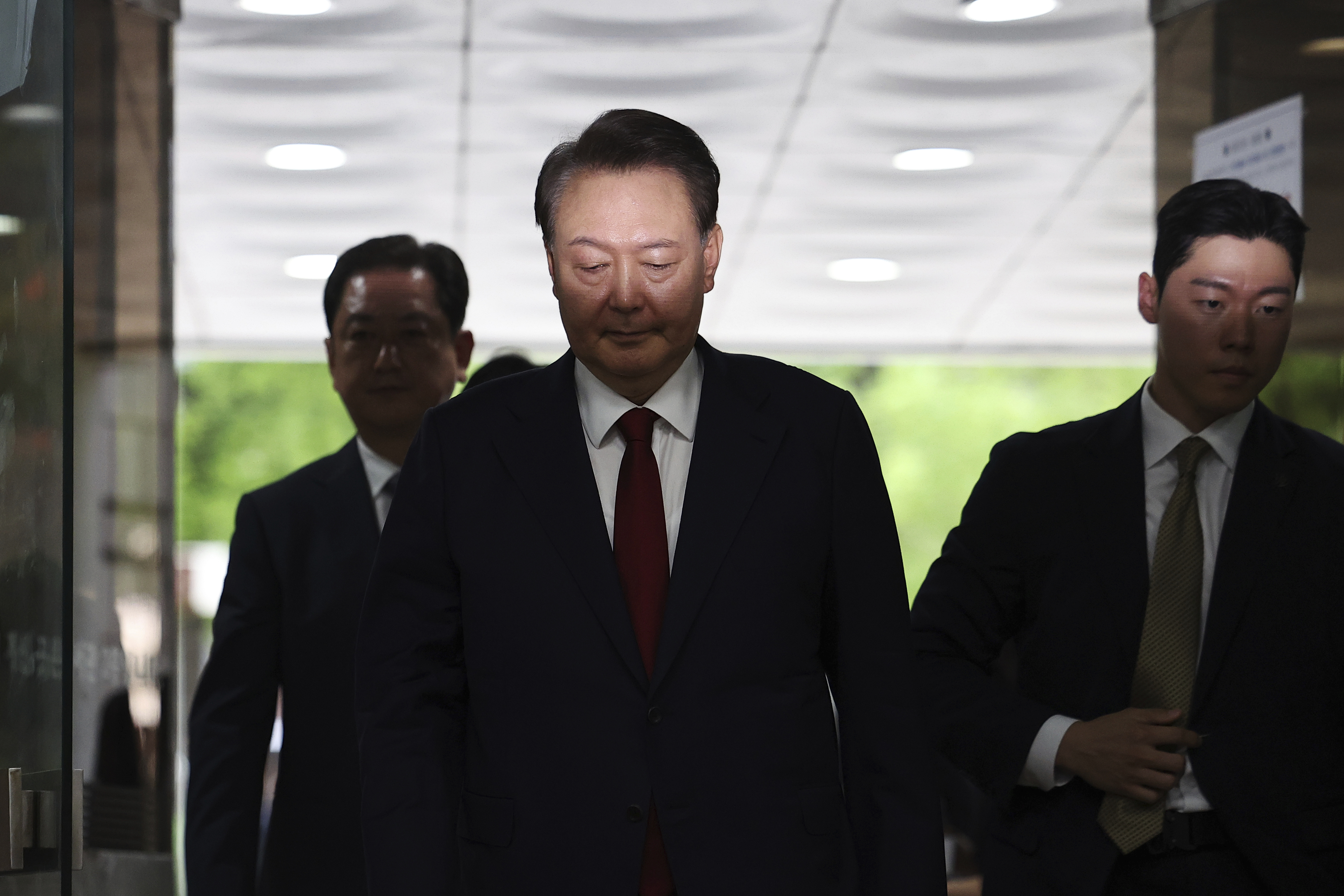 Former South Korean President Yoon Suk Yeol arriving at a court hearing.
