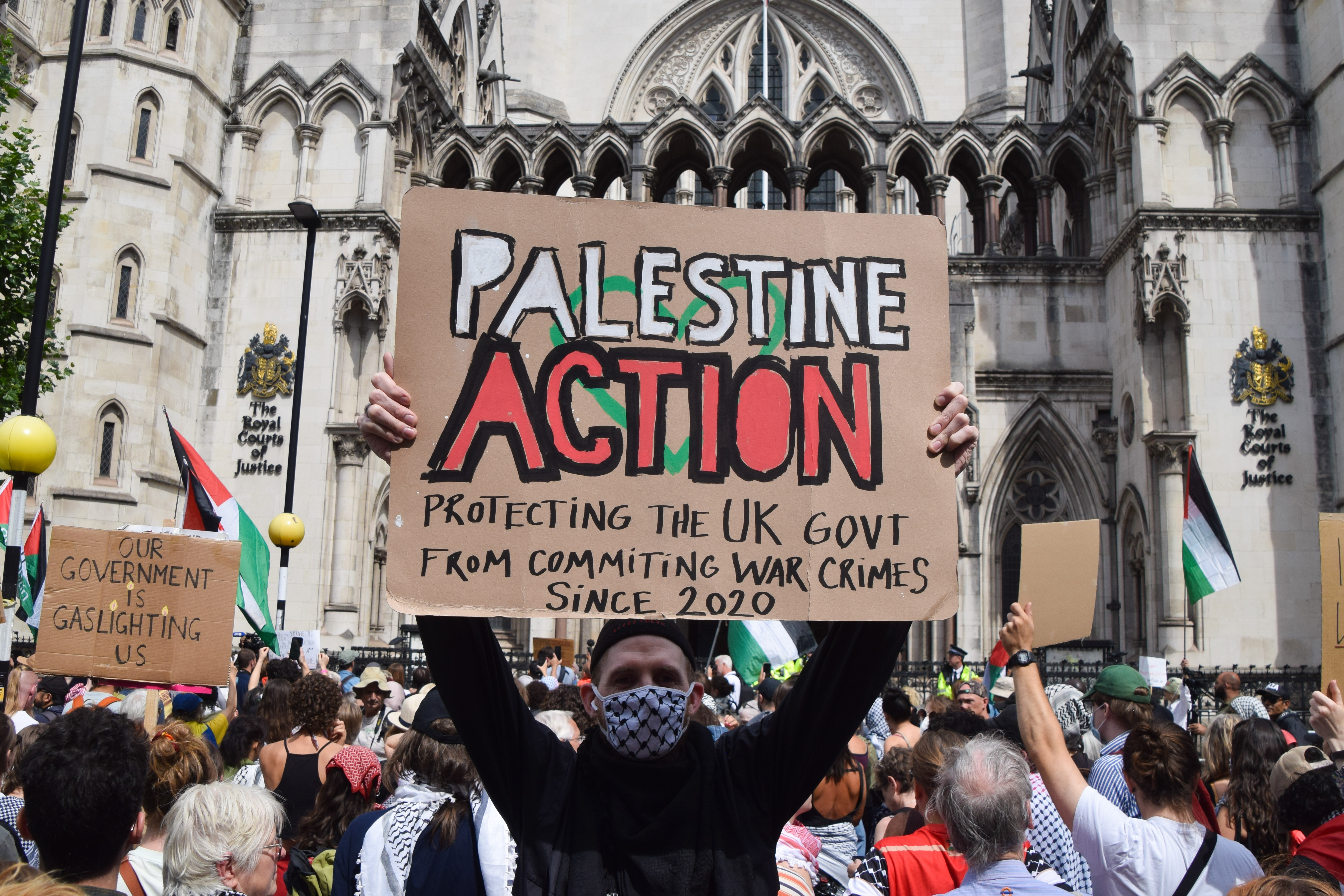 Protest outside the Royal Courts of Justice in London supporting Palestine Action.